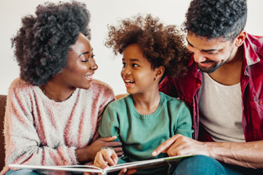 Family reading a book